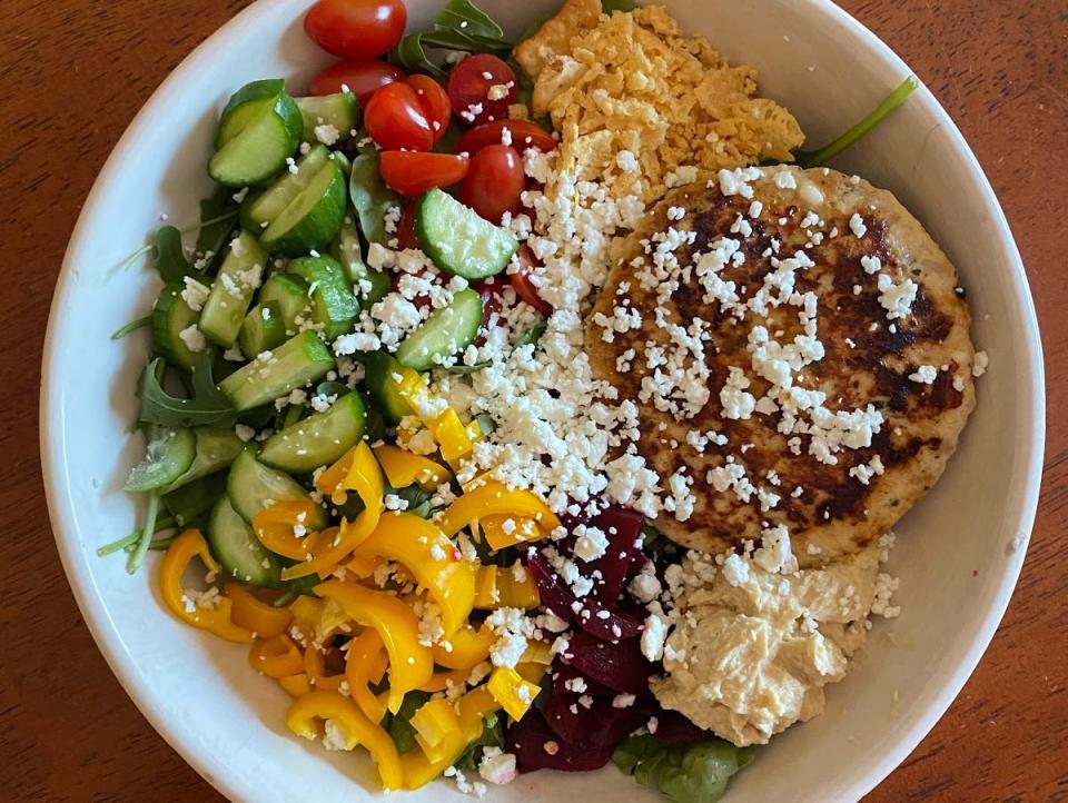 colorful burger bowl featuring an aldi mediterranean chicken pattie