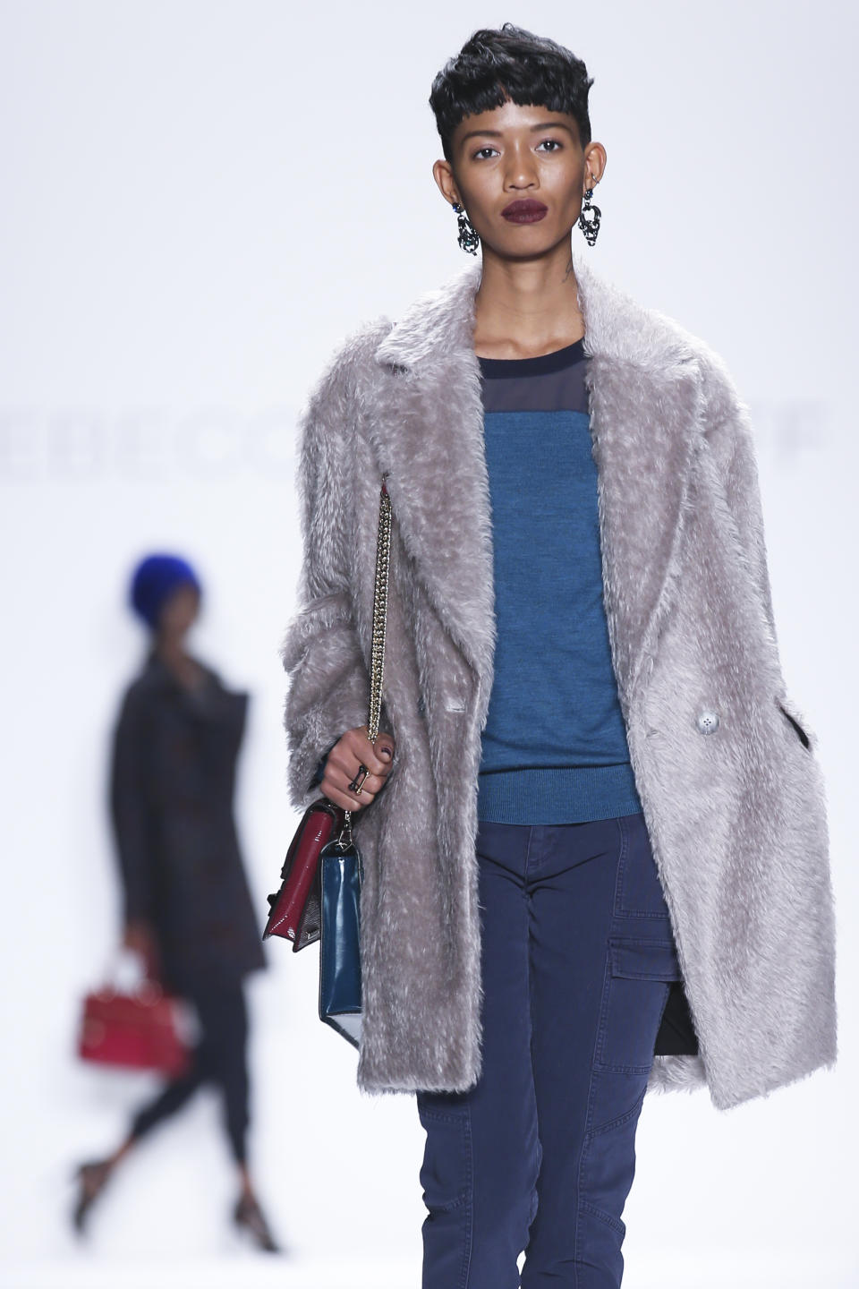 The Rebecca Minkoff Fall 2014 collection is modeled during Fashion Week, Friday, Feb. 7, 2014, in New York. (AP Photo/John Minchillo)