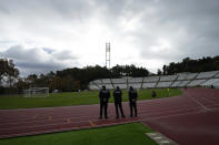 A Portuguese Under-23 league soccer match gets underway at the National stadium in Oeiras, outside Lisbon, Monday, Nov. 29, 2021. The stadium is the home ground of the Lisbon-based Belenenses SAD club which played a Portuguese Primeira Liga match against Benfica on Saturday starting with only nine players due to a coronavirus outbreak. Portuguese health authorities on Monday identified 13 cases of omicron, the new coronavirus variant spreading fast globally, among members of Belenenses SAD. (AP Photo/Armando Franca)