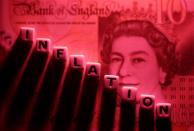 FILE PHOTO: Illustration shows plastic letters arranged to read "Inflation" are placed on British Pound banknote