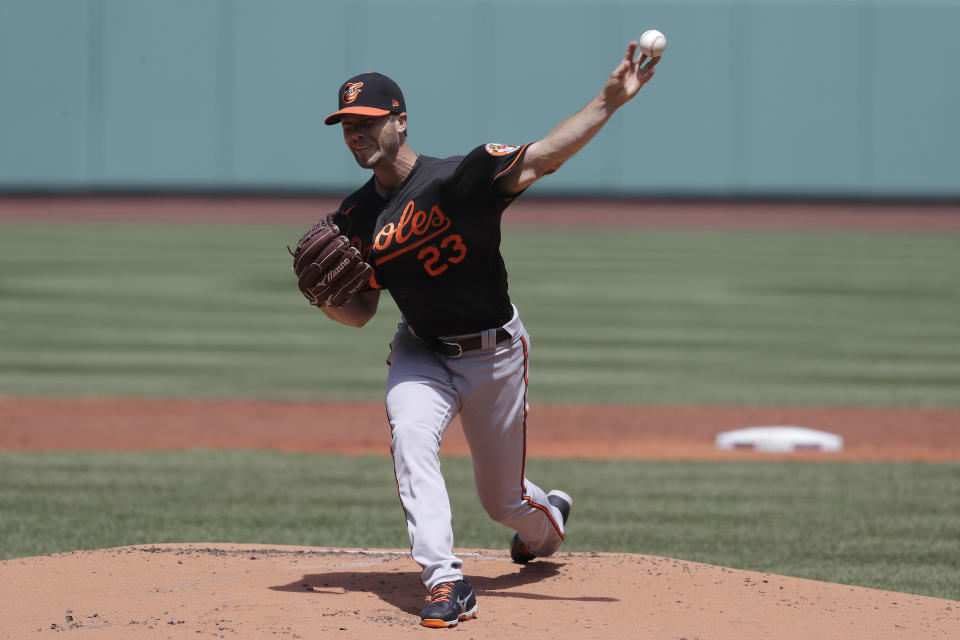 Baltimore Orioles' Wade LeBlanc delivers a pitch agains the Boston Red Sox during the first inning of a baseball game Sunday, July 26, 2020, in Boston. (AP Photo/Steven Senne)