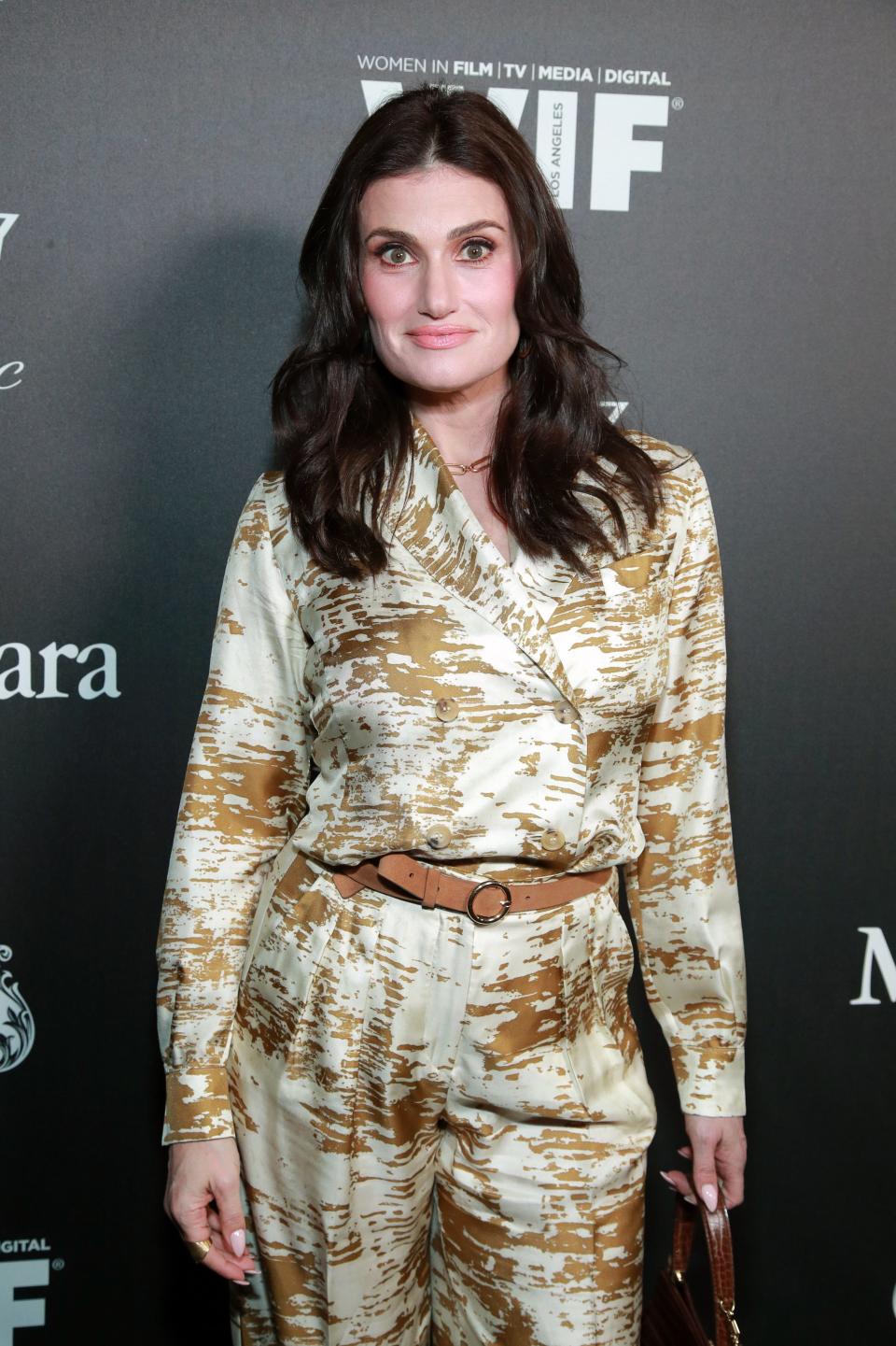 Actress/singer Idina Menzel, a co-host of the annual Women in Film Female Oscar Nominees Party, arrives at the Sunset Room Hollywood on Feb. 7, 2020.