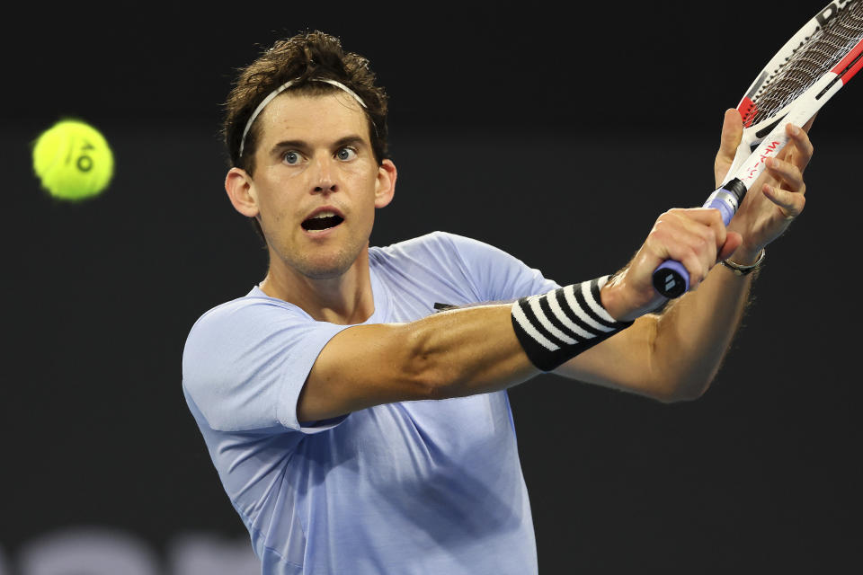 Dominic Thiem of Austria plays a shot in his match against Rafael Nadal of Spain during the Brisbane International tennis tournament in Brisbane, Australia, Tuesday, Jan. 2, 2024. (AP Photo/Tertius Pickard)