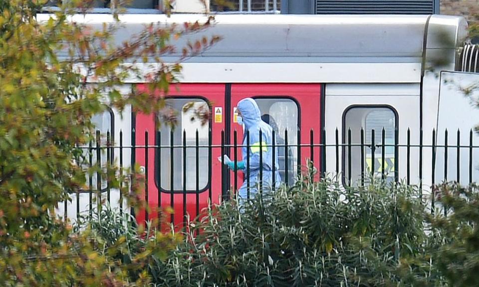 Forensics officer on the platform at Parsons Green station in west London after the explosion.