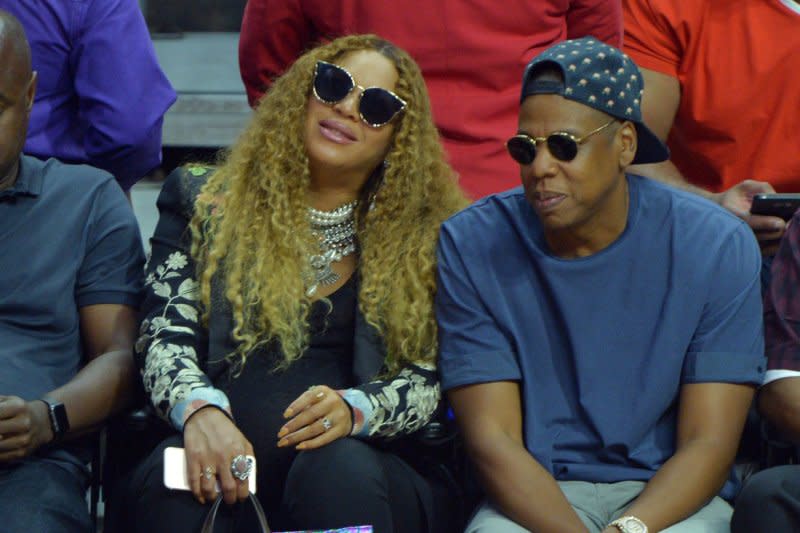 Beyonce and Jay Z sit courtside as they attend Game 7 of the best-of-seven first round playoffs between the Los Angeles Clippers and the Utah Jazz at Staples Center in Los Angeles in 2017. File Photo by Jim Ruymen/UPI