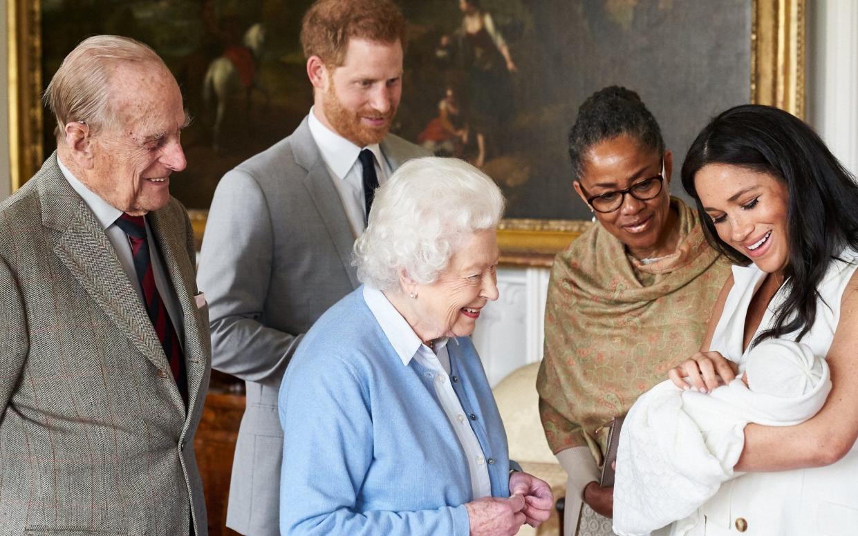 The Duchess of Sussex shows her newborn, Master Archie, to her family - PA