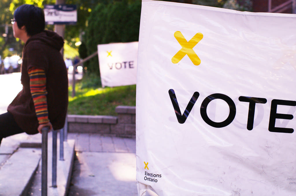 Signs encouraging Ontarians to vote are placed outside prior to the 2011 Ontario election. (Photo from Flickr/knehcsg)