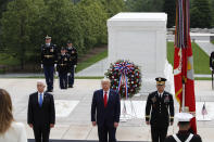 President Donald Trump stands with Vice President Mike Pence and Gen Omar Jones, Commanding General at Joint Force Headquarters, National Capital Region and United States Army Military District of Washington, at the Tomb of the Unknown Soldier in Arlington National Cemetery, in honor of Memorial Day, Monday, May 25, 2020, in Arlington, Va. (AP Photo/Alex Brandon)