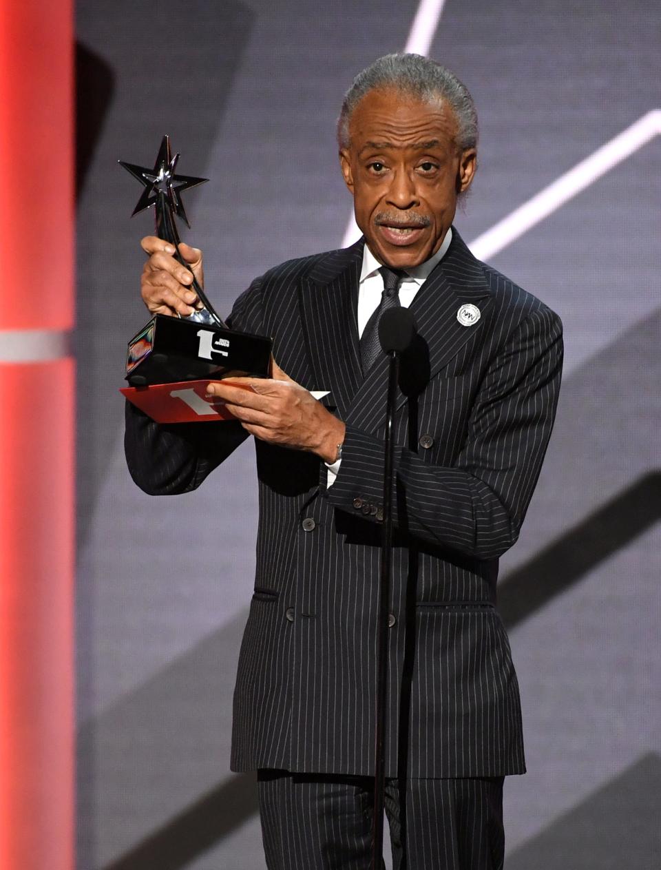 Rev. Al Sharpton accepts Snoop Dogg's Dr. Bobby Jones Best Gospel/Inspirational Award at the 2019 BET Awards on June 23, 2019.