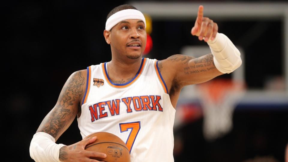 Mar 5, 2017;  New York, NY, USA;  New York Knicks small forward Carmelo Anthony (7) points into the stands before a game against the Golden State Warriors at Madison Square Garden.  Mandatory Credit: Brad Penner-USA TODAY Sports