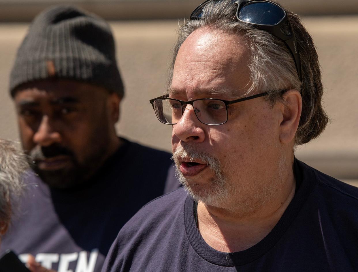 Rideshare driver Keith Cooper of Worcester speaks during a rally in support of driver independence at City Hall Tuesday.