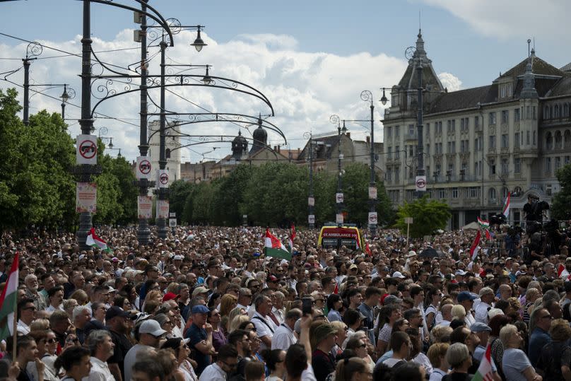 People listen to Péter Magyar's speech at a campaign rally in the rural city of Debrecen, Hungary, on Sunday, May 5, 2024.