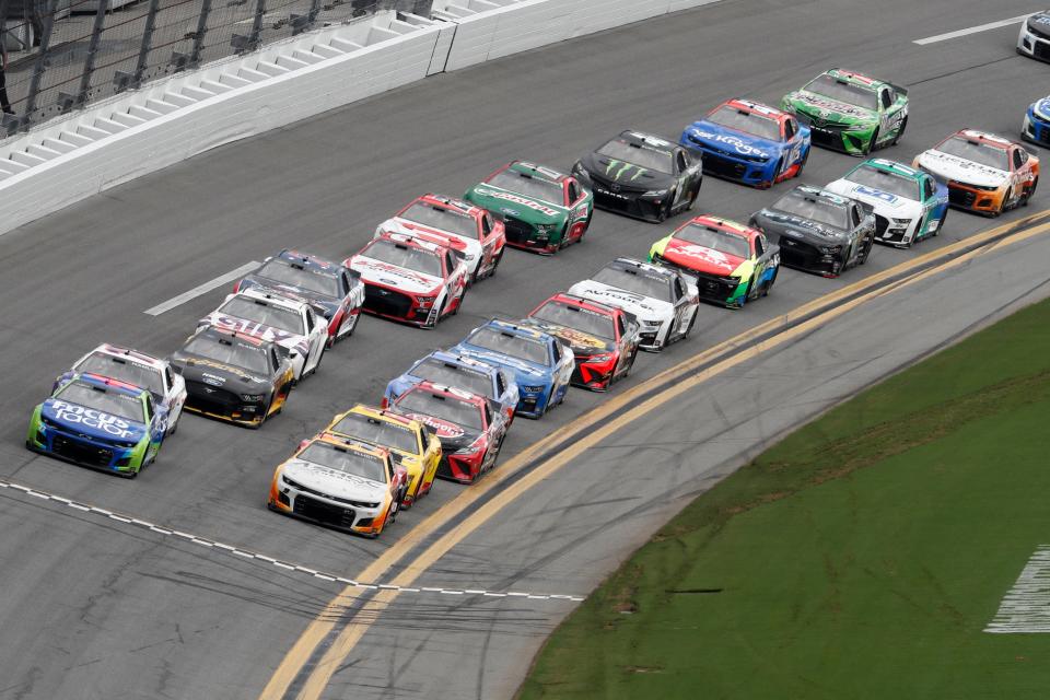 Cars going fast at Daytona International Speedway, one of several Florida views that new News-Journal sports editor Ryan Pritt will never grow tired of.