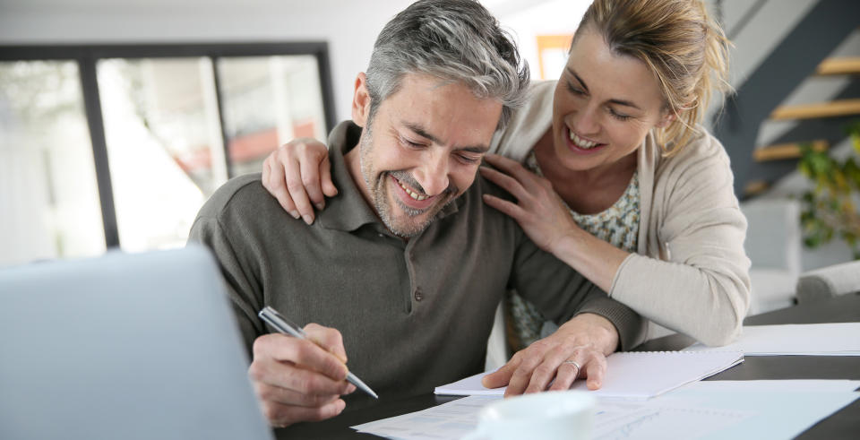 couple calculating finances