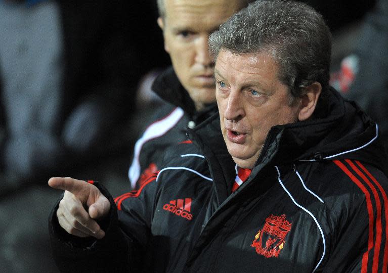 Roy Hodgson gives instructions before Liverpool play Blackburn at Ewood Park on January 5, 2011