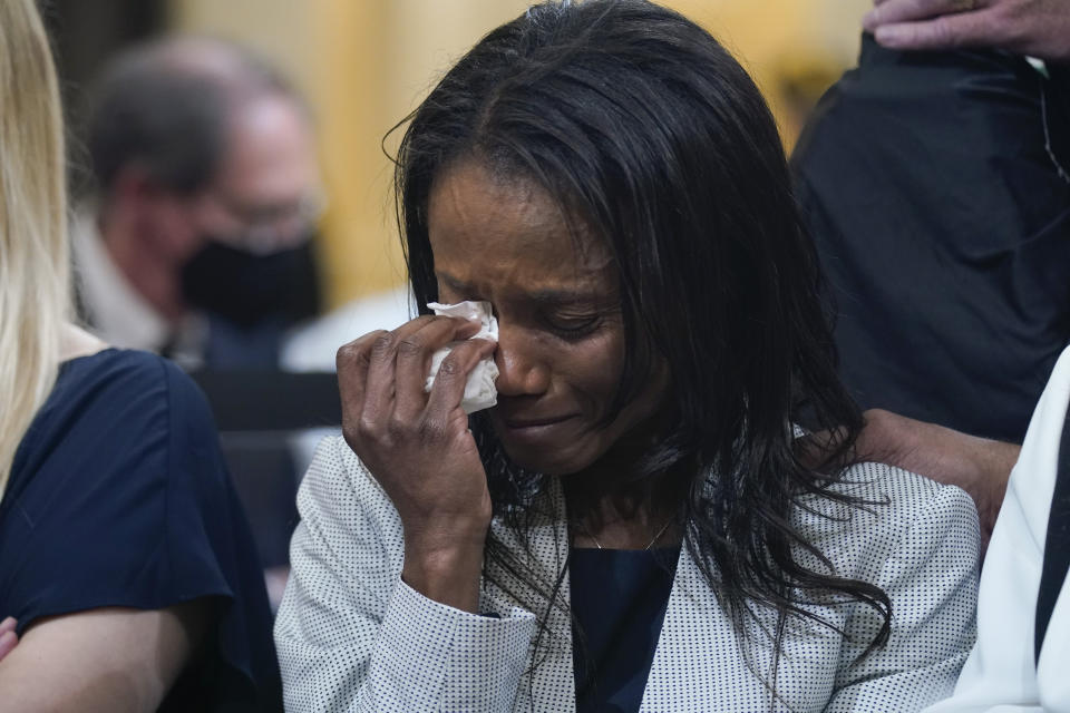 Serena Liebengood, widow of Capitol Police officer Howie Liebengood, cries as a video of the Jan. 6 attack on the U.S. Capitol is played during a public hearing of the House select committee investigating the attack is held on Capitol Hill, Thursday, June 9, 2022, in Washington. (AP Photo/Andrew Harnik)