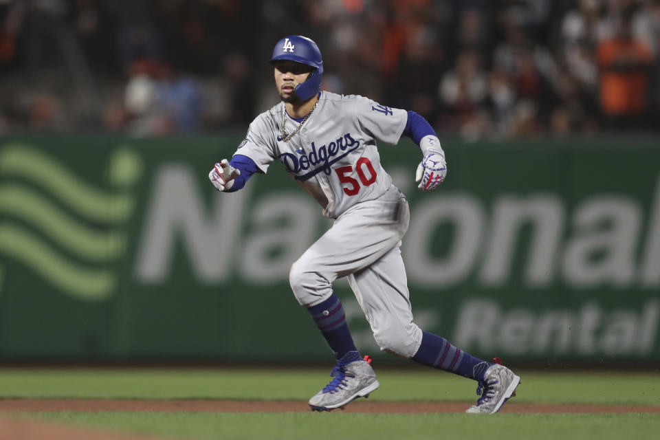 Los Angeles Dodgers' Mookie Betts takes a lead off second base during the fourth inning of Game 5 of a baseball National League Division Series against the San Francisco Giants Thursday, Oct. 14, 2021, in San Francisco. (AP Photo/Jed Jacobsohn)