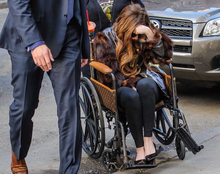 Lady Gaga's got a new set of wheels! The superstar, who underwent hip surgery in February 2013 causing the cancellation of her "Born this Way" tour, literally pimped out her ride with a Louis Vuitton wheelchair to help her get around. We'd like to think one designer wheelchair is enough for a person, but then again this is Lady Gaga we're talking about ...