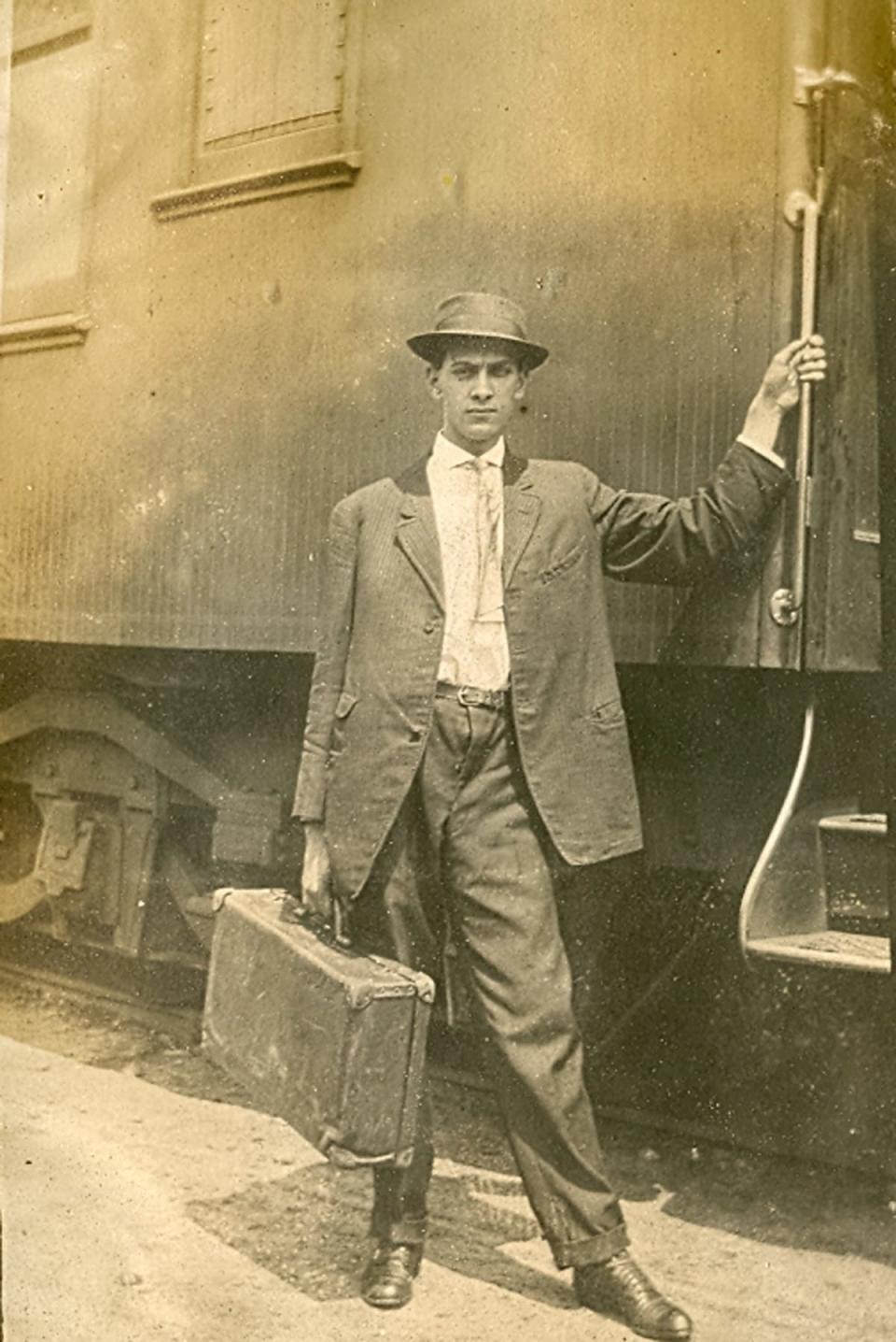 John Harry Walker comes off the train in Asheville in the 1910s. He found a lost bow and love in Aston Park.