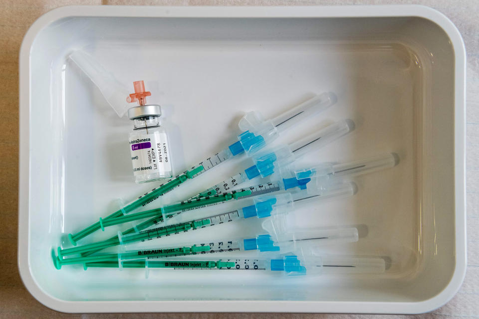 Image: A vial containing the AstraZeneca Covid-19 vaccine is seen next to some syringes on a tray at the university hospital in Halle/Saale, eastern Germany (Jens Schlueter / AFP - Getty Images file)