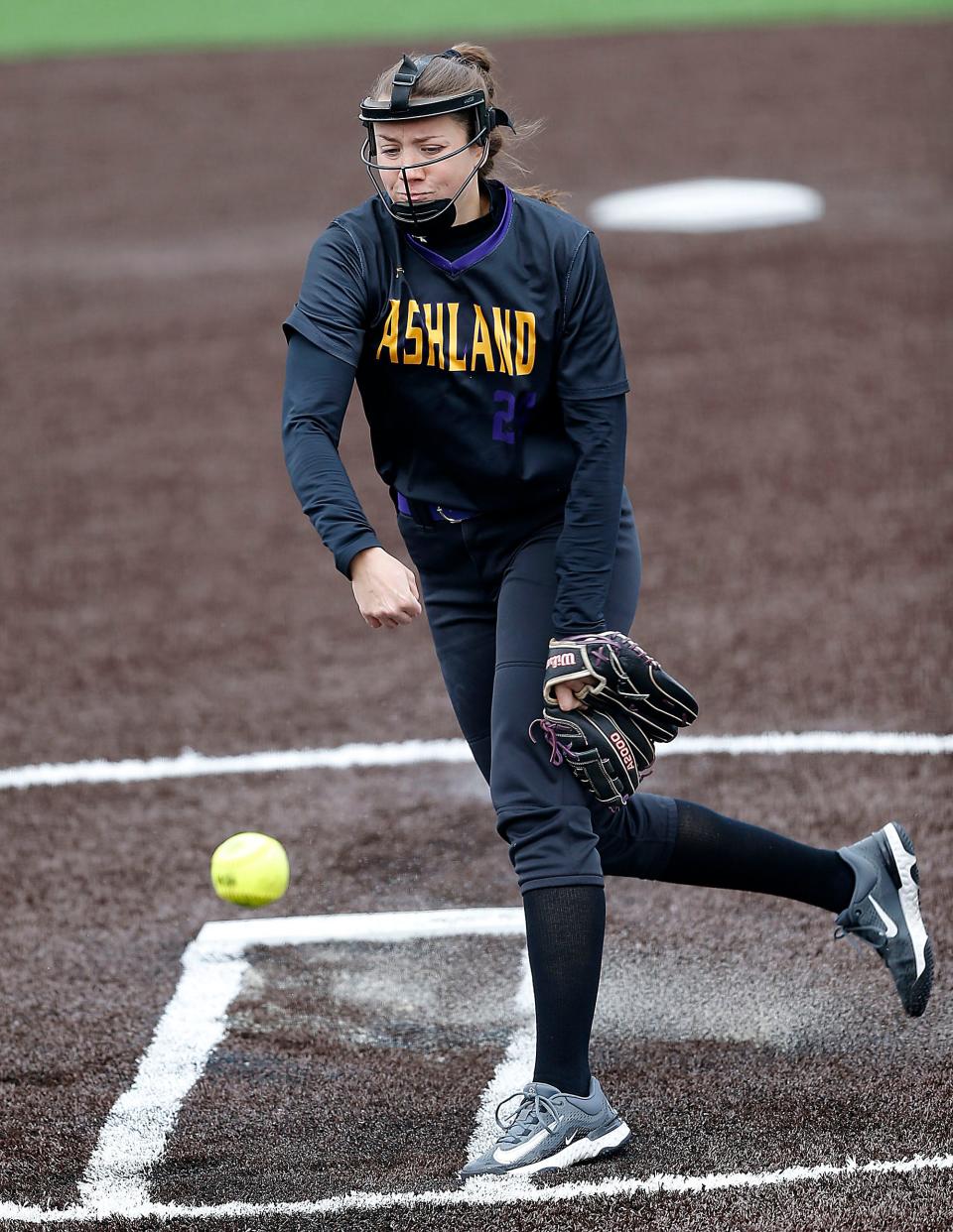 Ashland University's Kayla Ruperto (24) delivers a pitch against Ursuline College during college softball action Tuesday, March 28, 2023. TOM E. PUSKAR/ASHLAND TIMES-GAZETTE