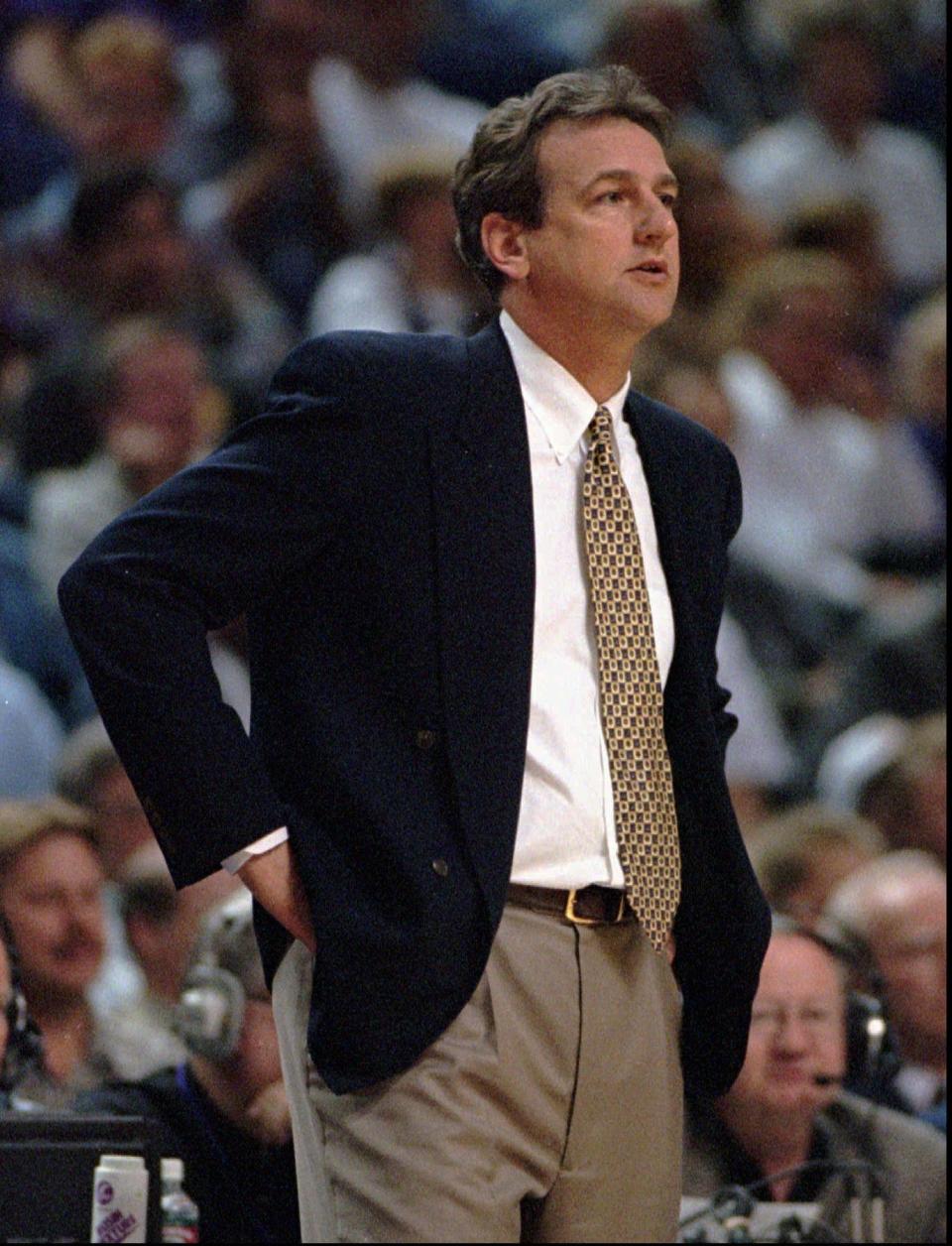 Phoenix Suns head coach Paul Westphal watches game action between the Suns and the Dallas Mavericks at the America West Arena in Phoenix Friday Jan. 12, 1996. The Suns have called a news conference Tuesday afternoon Jan. 16, 1996, amid speculation that Westphal will be fired.