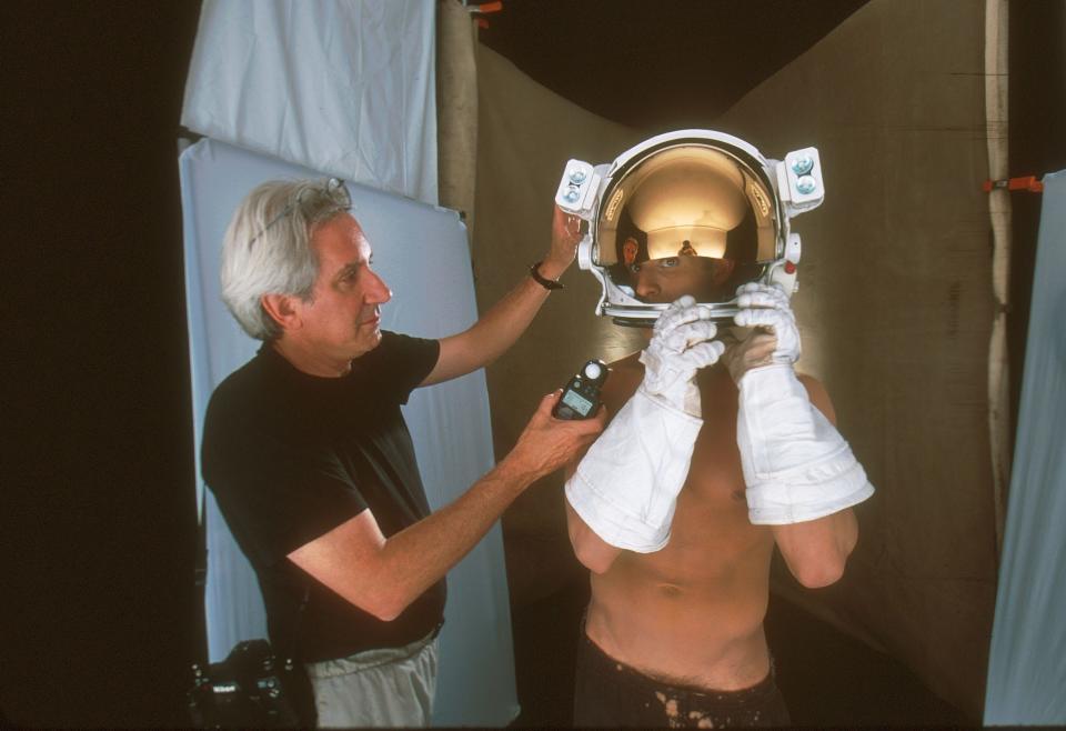 Cary Wolinsky checks his light meter during a shot for the January 2001 National Geographic story "The Body in Space."