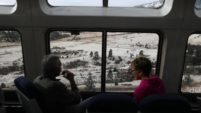 Passengers enjoy the sightseer lounge car on Amtrak's California Zephyr during its daily 2,438-mile trip to Emeryville/San Francisco from Chicago that takes roughly 52 hours on March 24, 2017 in Denver.