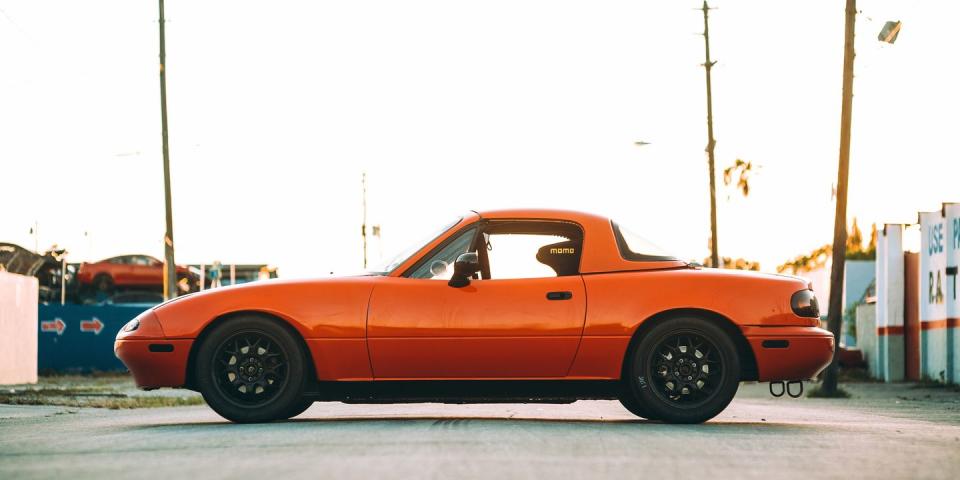 <p>I'm sure many of you reading this are groaning at the obviousness of a Miata on this list, but the fact of the matter is that early Miatas are still affordable, and perfectly suited for amateur racing. There's a reason why you see at least five at every race track. <a href="https://www.ebay.com/itm/1990-Mazda-MX-5-Miata/224045742363?hash=item342a2ab91b:g:ERMAAOSwVSte5lIQ" rel="nofollow noopener" target="_blank" data-ylk="slk:Here's one;elm:context_link;itc:0;sec:content-canvas" class="link ">Here's one</a> up for bidding right now. </p>