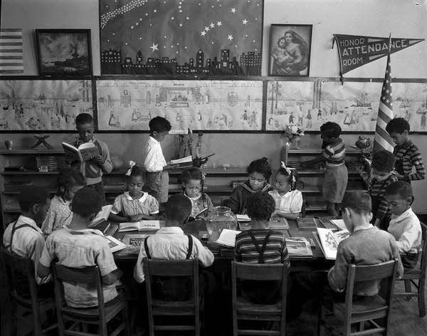 Children study during a class in 1946 in Benjamin Banneker School.