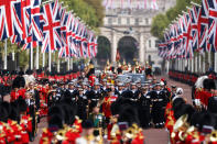 <p>The Coldstream Guards travel along The Mall during the ceremonial procession after the Queen's state funeral. (Getty Images)</p> 