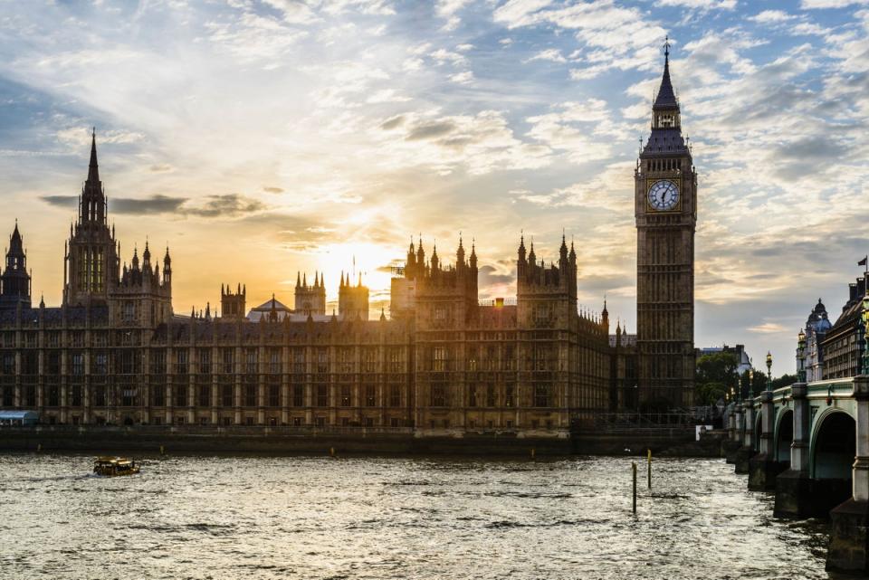 E14PEX Sun setting over Houses of Parliament, London, United Kingdom