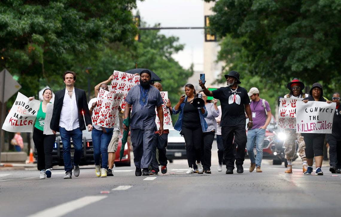 Activists march down Throckmorton Street in downtown Fort Worth while protesting the deaths at the Tarrant County Jail, including Anthony Johnson Jr.’s, on Thursday, May 30, 2024.