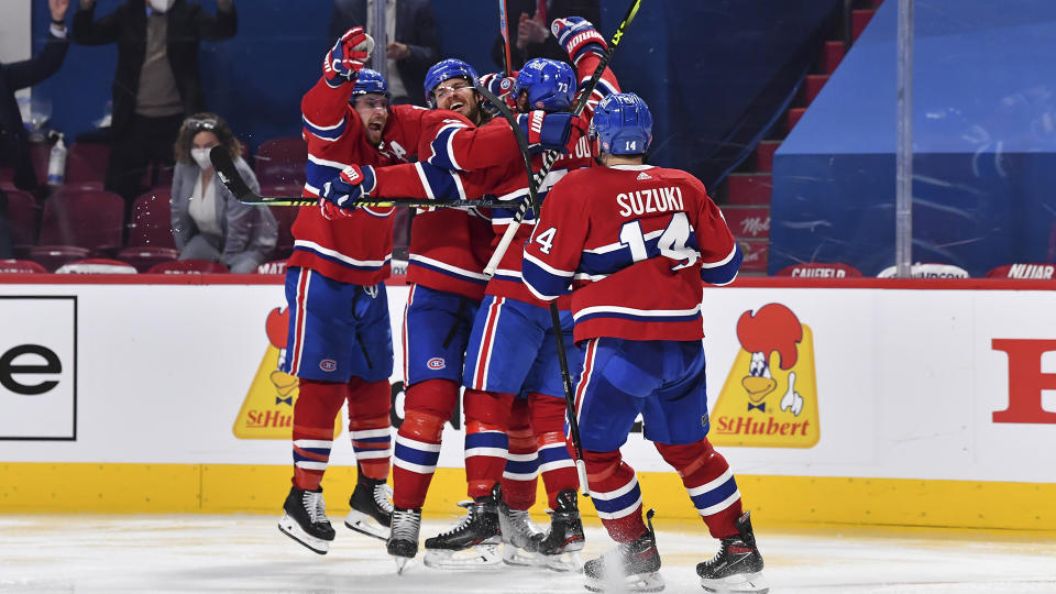 MONTREAL, QC - JUNE 07: The Montreal Canadiens celebrate an overtime victory against the Winnipeg Jets in Game Four of the Second Round of the 2021 Stanley Cup Playoffs at the Bell Centre on June 7, 2021 in Montreal, Canada.  The Montreal Canadiens defeated the Winnipeg Jets 3-2 in overtime and eliminate them with a 4-0 series win.  (Photo by Minas Panagiotakis/Getty Images)