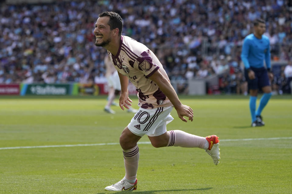 Portland Timbers midfielder Sebastián Blanco (10) celebrates after scoring a goal against Minnesota United during the second half of an MLS soccer match at Allianz Field in Saint Paul, Minn., Saturday, July 30, 2022. (AP Photo/Abbie Parr)