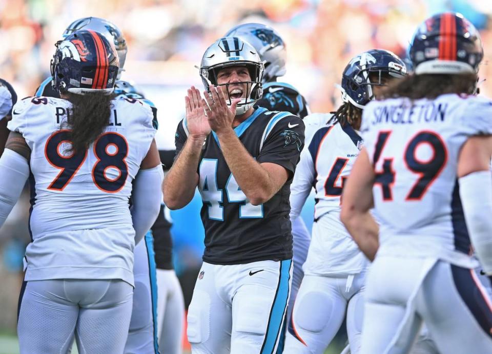 Carolina Panthers long snapper JJ Jansen, center, celebrates a field goal by kicker Eddy Pineiro during second half action against the Denver Broncos on Sunday, November 27, 2022 at Bank of America Stadium in Charlotte, NC. Jansen tied former kicker John Kasey for most games played at 221 in franchise history.