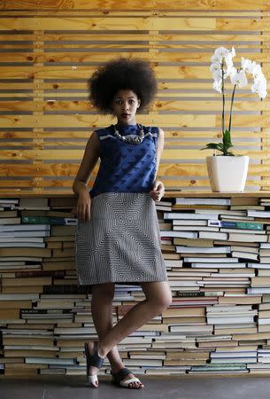 South African model Lulama Mlambo poses while wearing clothes made by Kisua.com, an online clothing retailer launched by Ghanaian entrepreneur Samuel Mensah, in Johannesburg, February 2, 2015. REUTERS/Siphiwe Sibeko