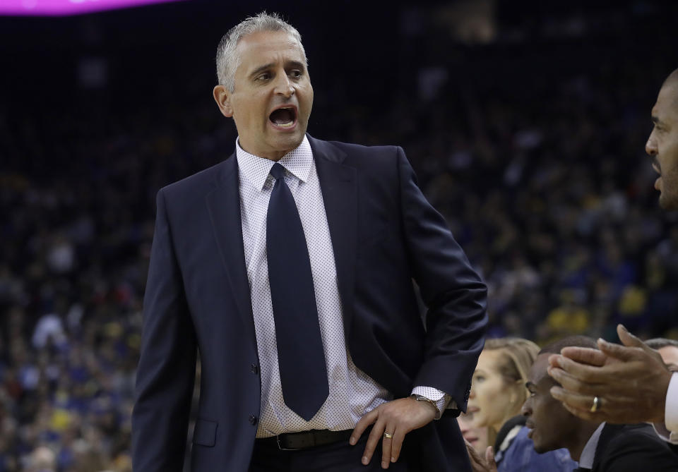 Phoenix Suns head coach Igor Kokoskov yells toward his bench during the first half of his team's NBA basketball game against the Golden State Warriors in Oakland, Calif., Sunday, March 10, 2019. (AP Photo/Jeff Chiu)