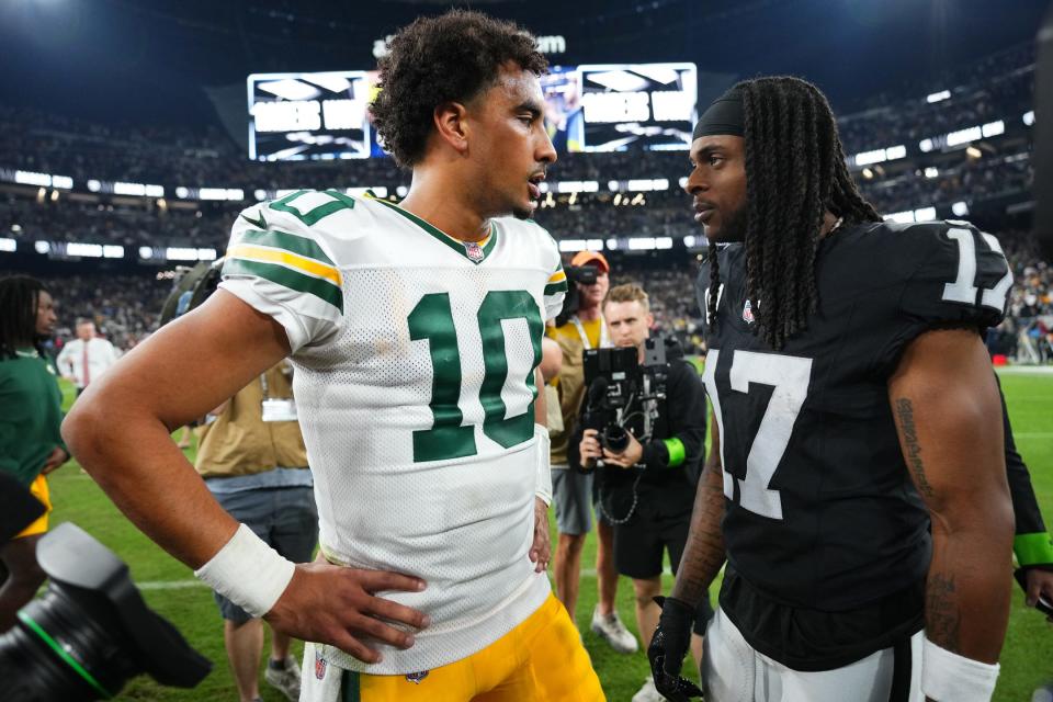 Jordan Love (10) of the Green Bay Packers talks with Davante Adams (17) of the Las Vegas Raiders following the game at Allegiant Stadium on Oct. 9, 2023, in Las Vegas, Nevada. Adams was playing his first game against his former team after he was traded in 2022.