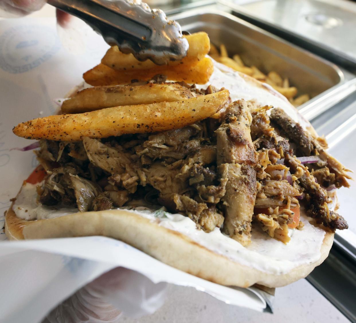 This beef gyro was made by Jennifer Mendes at Grilla Greek Kouzina, 224 Broadway, Taunton, on Wednesday, April 3, 2024.