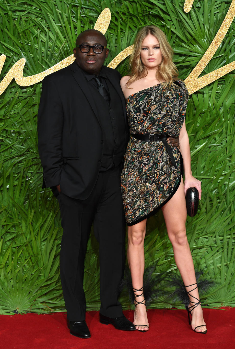 Edward Enninful and Anna Ewers attending the Fashion Awards 2017, in partnership with Swarovski, held at the Royal Albert Hall, London. Picture Credit Should Read: Doug Peters/ EMPICS Entertainment