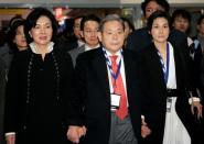 FILE PHOTO: Former Samsung Electronics Chairman Lee tours the CES with his wife and daughter in Las Vegas