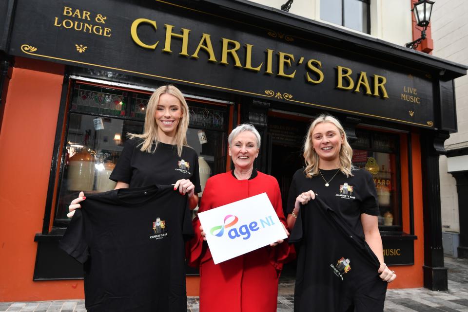 Una Burns (left), manager of Charlie’s Bar Enniskillen and Sarah Thompson (right), founder of Ted & Stitch, with Siobhan Casey, director of marketing and business development at Age NI (Fiona Brown Communications/PA)