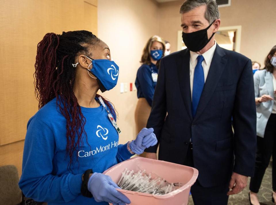 Gov. Roy Cooper said Wednesday many pandemic-related restrictions, including limits on businesses and distancing requirements, are expected to end June 1.