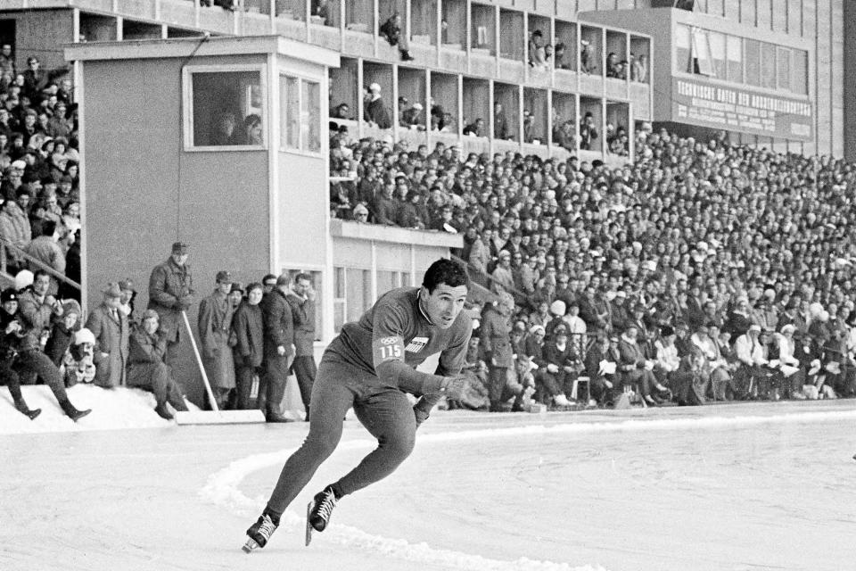 Terry McDermott skates in the 500-meter speedskating event on his way to a gold medal at the 1964 Winter Olympics.