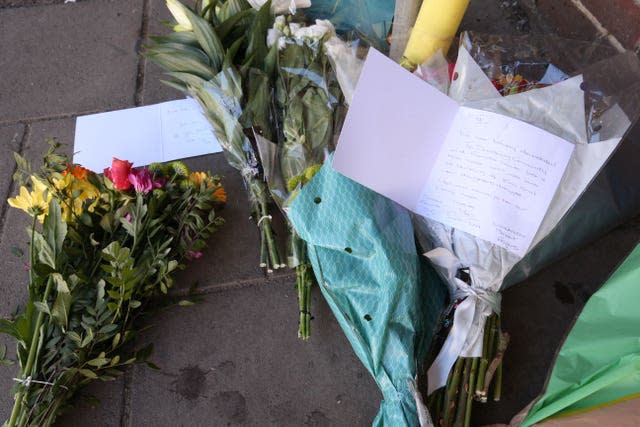 Flowers left at the scene near Church Street 