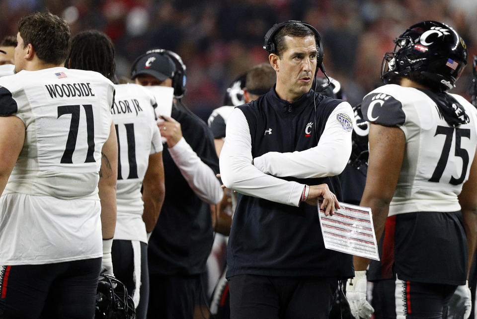 ARLINGTON, TEXAS - DECEMBER 31: Head coach Luke Fickell of the Cincinnati Bearcats stands on the sidelines during the game against the Alabama Crimson Tide at AT&amp;T Stadium on December 31, 2021 in Arlington, Texas. (Photo by Richard Rodriguez/Getty Images)