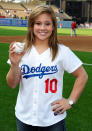 Olympic gymnast Shawn Johnson Practices Pitching before throwing the ceremonial first pitch at Dodgers game at Dodger Stadium on June 1, 2009 in Los Angeles, California.