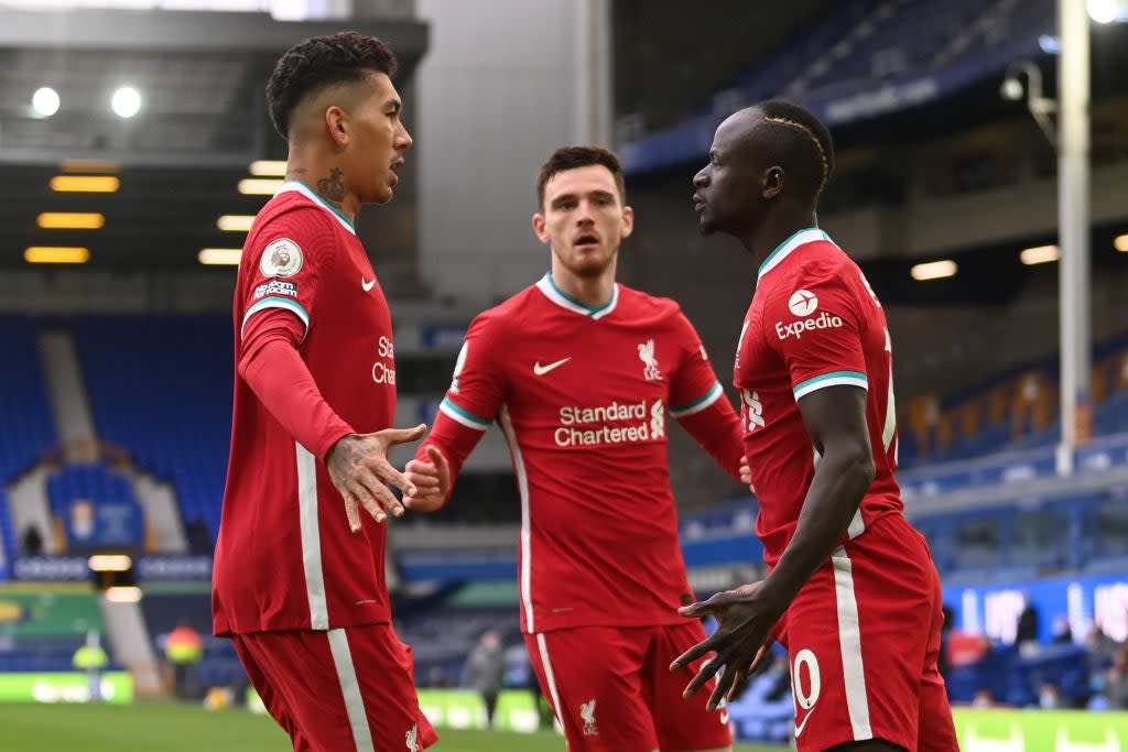 Liverpool forwards Sadio Mane and Roberto Firmino (POOL/AFP via Getty Images)