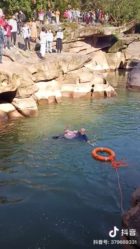 Screengrab of British diplomat saving drowning student in southwest China